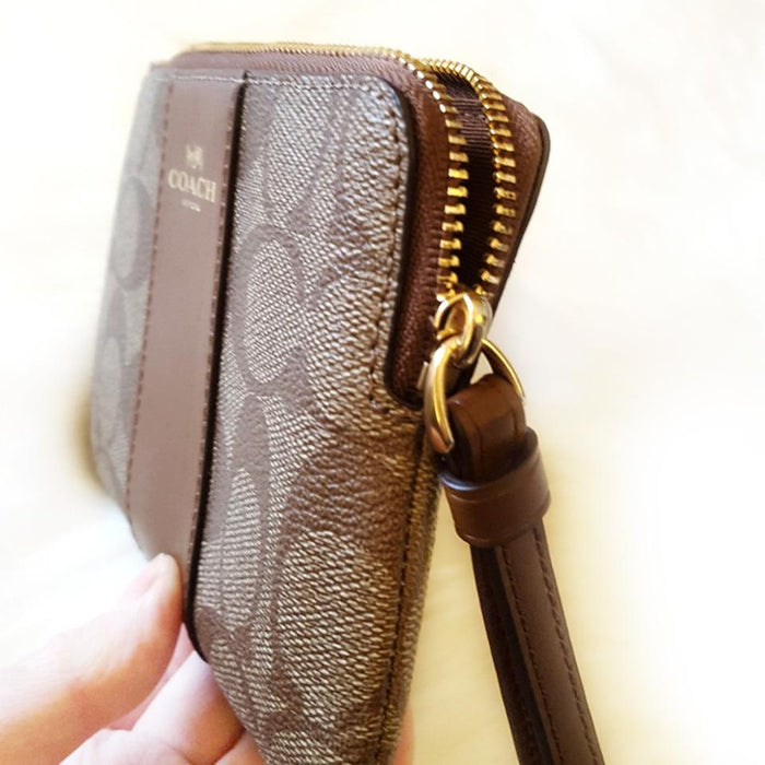 COACH SIGNATURE PVC LEATHER CORNER ZIP WRISTLET, Medium, Khaki/Saddle F58035